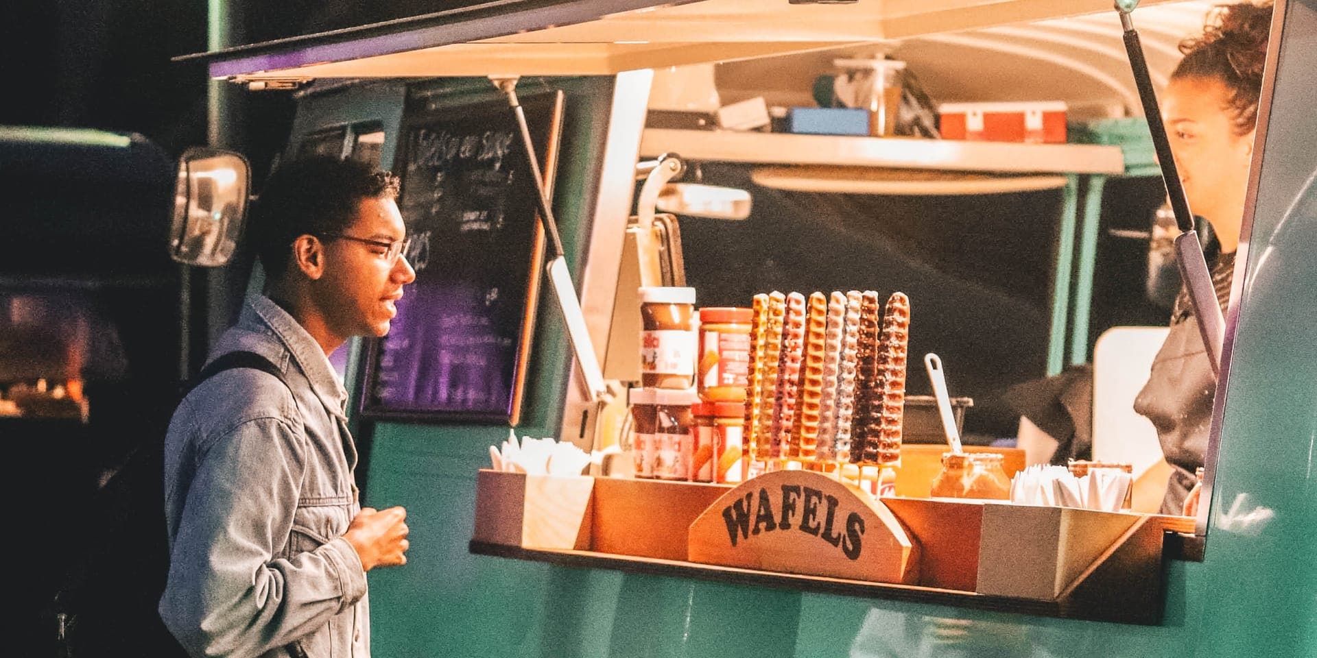Customer ordering at a food truck